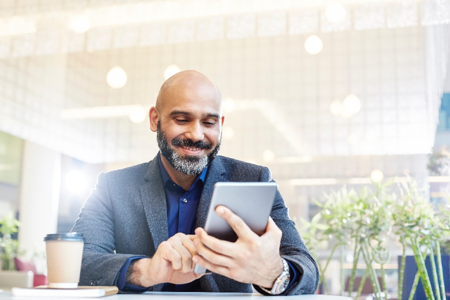 GettyImages 594203153 A man working on a tablet